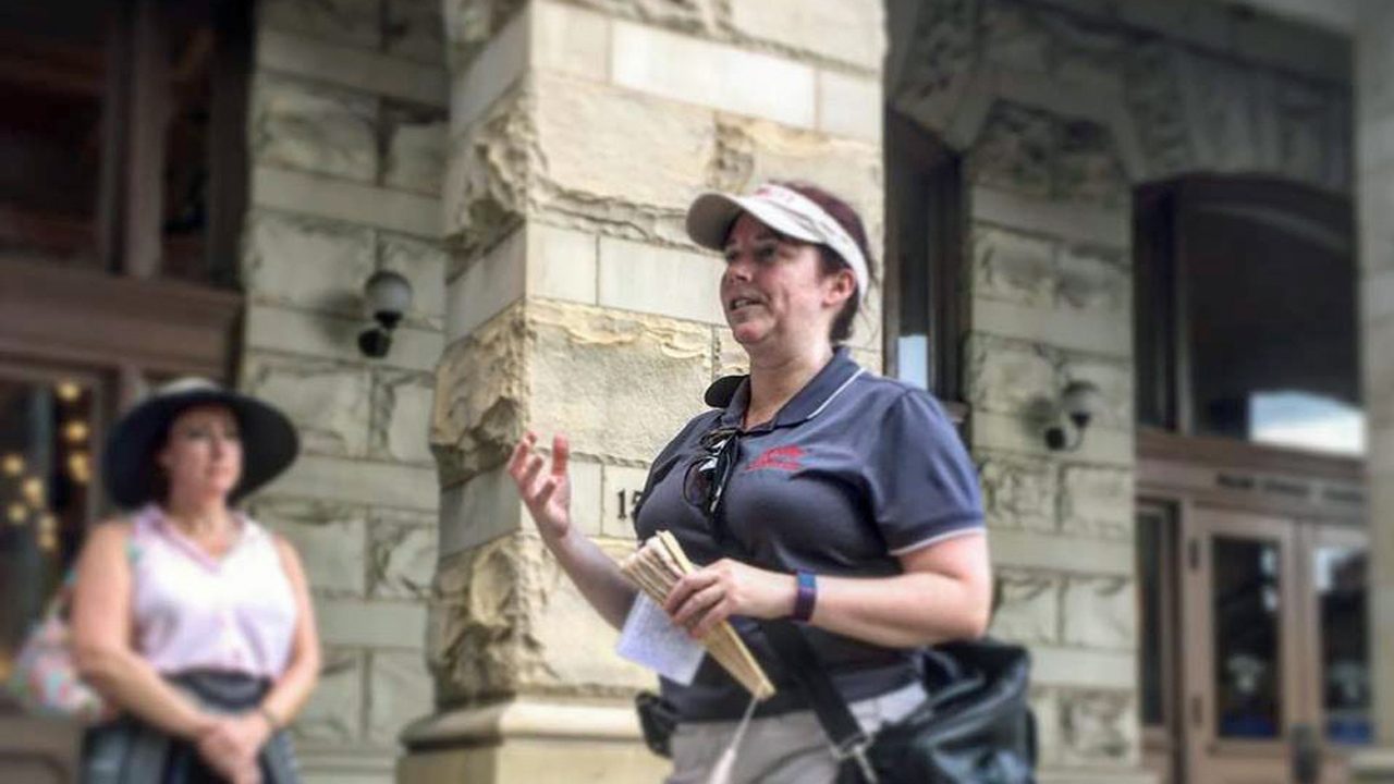 A RVA Hidden History guide speaking outside Richmond Main Street Station